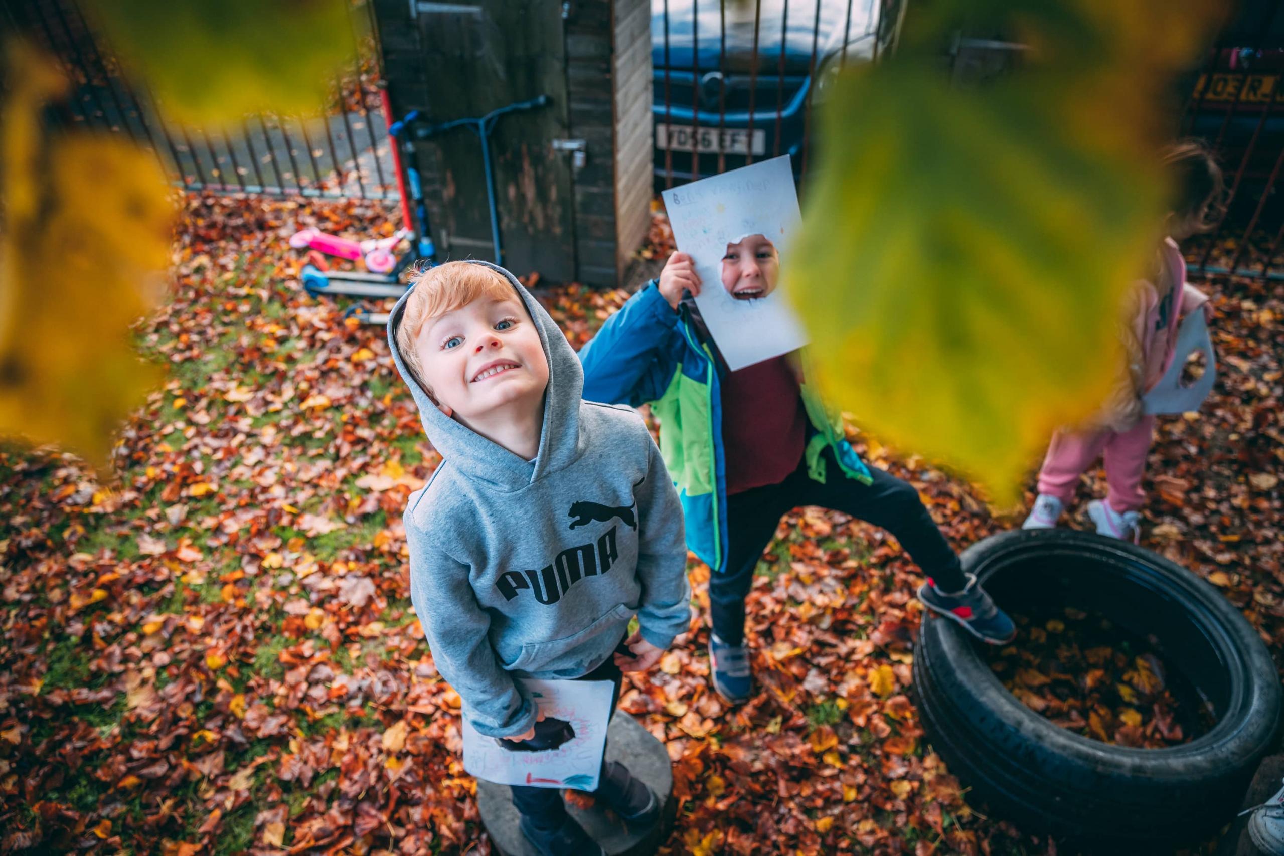 Pupils looking at leaves
